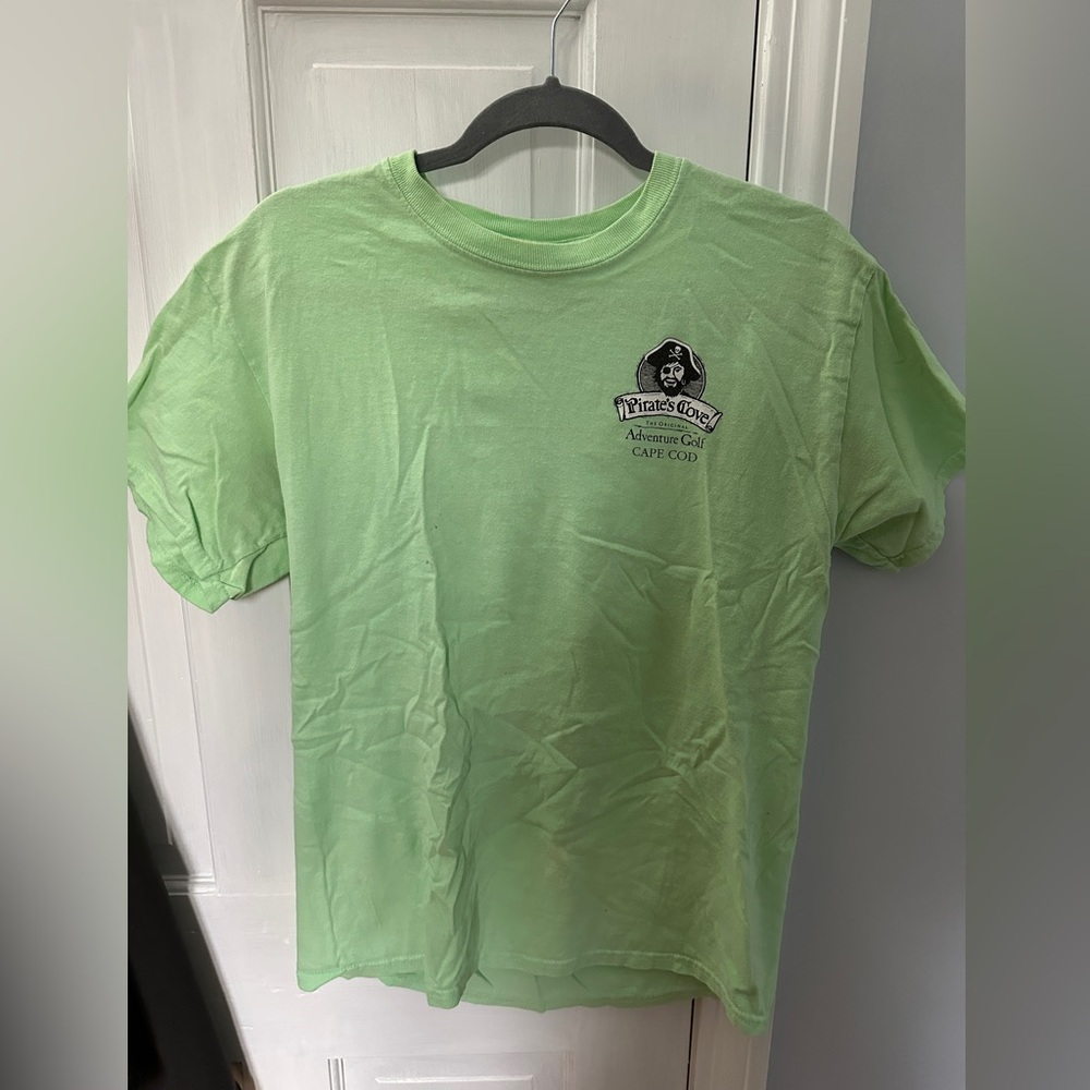 wrinkled from being folded; limited edition pirates cove adventure minigolf tee
